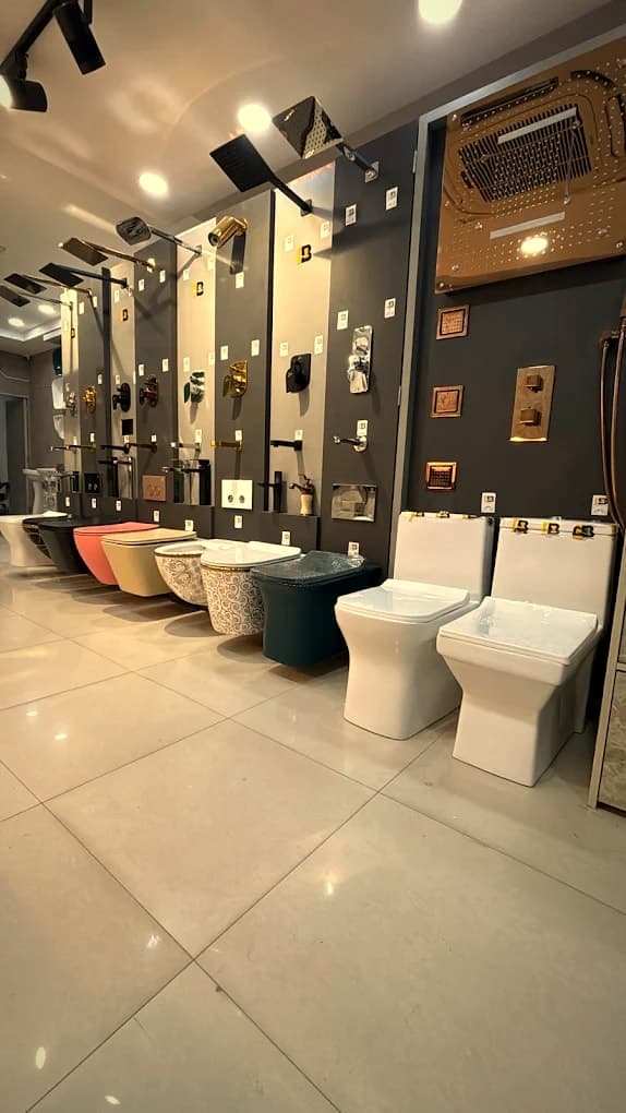 Inside Punjab Sanitary Store, Dhakoli: toilets, faucets and overhead showers on display